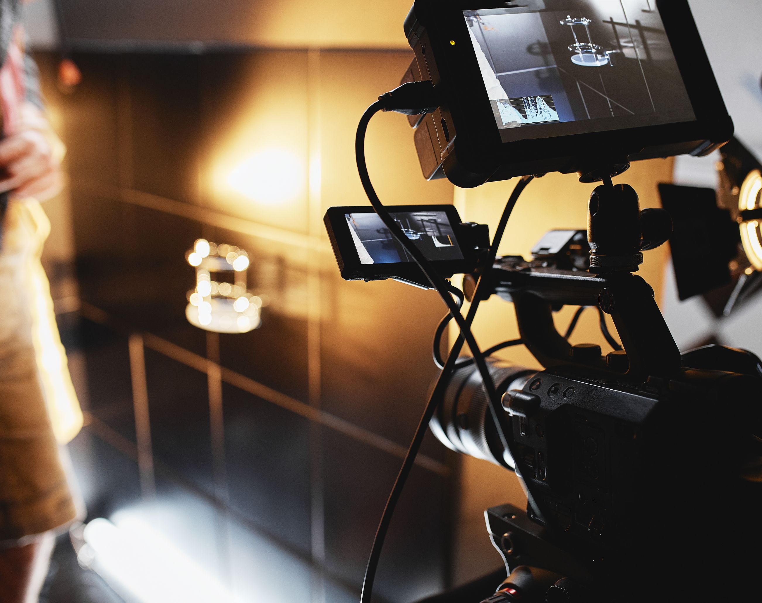VKTWA Camera filming a reflective glass object.